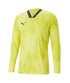 A neon yellow long-sleeve Puma sports jersey featuring a black V-neck and a subtle tonal geometric pattern.