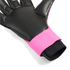 Close-up of a goalkeeper glove featuring a black latex palm and a bright pink wrist strap. The thumb is labeled "4MM SUPERIOR GRIP LATEX."