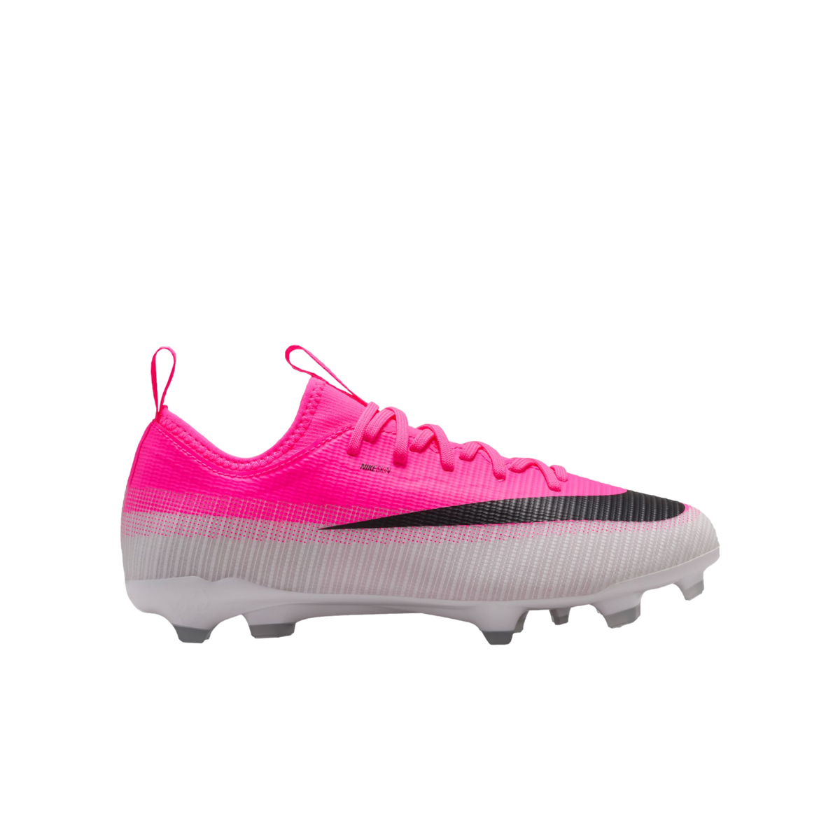 A bright pink and white Nike soccer cleat with a large black swoosh, pink laces, and a studded white sole.