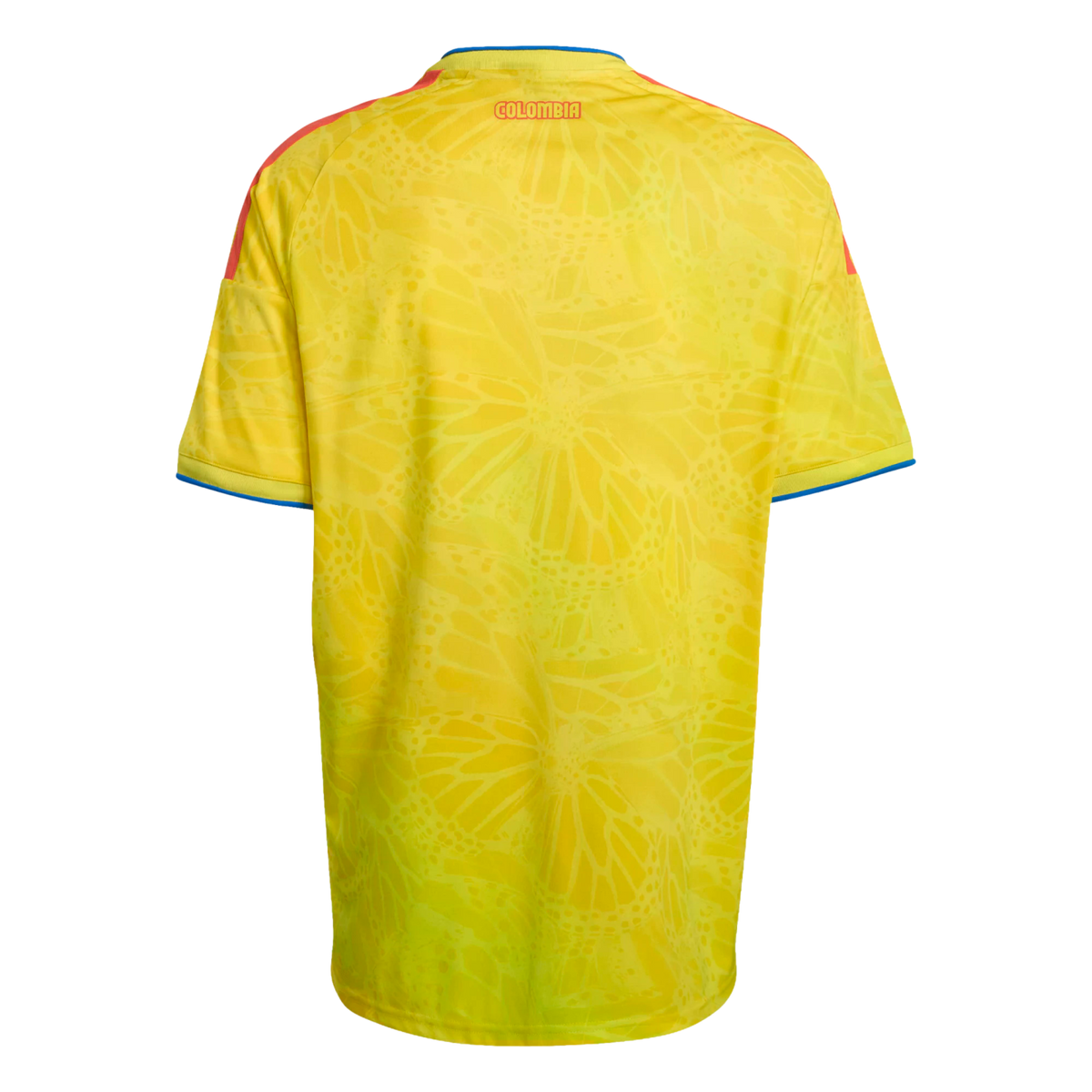 Back of a yellow Colombia soccer jersey with a subtle butterfly wing pattern, red shoulder stripes, and "COLOMBIA" in red text near the collar.