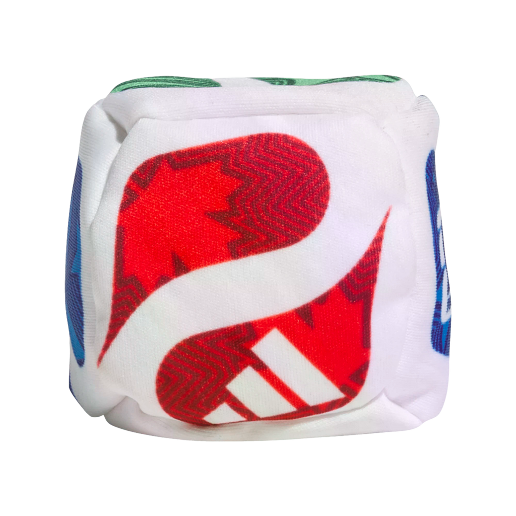 A plush white cube toy featuring colorful abstract graphics. The front face shows a red shape with white Adidas stripes.