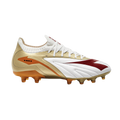 A gold, white, and maroon Diadora soccer cleat with orange studs, shown in profile against a white background.