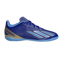 Royal blue Messi indoor soccer shoe with light blue stripes, a gold heel section with "MESSI" text, and a light blue rubber sole.