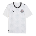A white Puma Egypt national football team jersey with a subtle light gray geometric pyramid pattern across the front. It features a black crew neck collar, a black Puma logo on the right chest, and the Egyptian Football Association crest with seven stars 